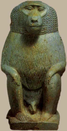 Estatuilla de babuino exhibiendo los genitales en actitud de guardian. Fayenza verde. Periodo Tardio.