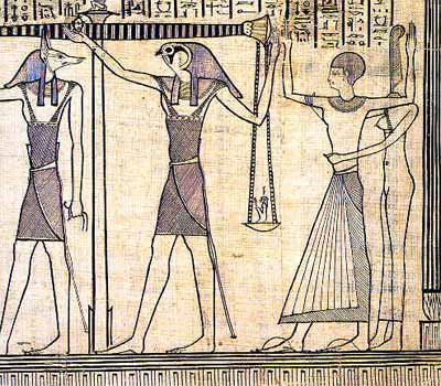El difunto es conducido por Maat ante la balanza donde su corazón será pesado por Anubis y Horus (papiro del Museo del Louvre)