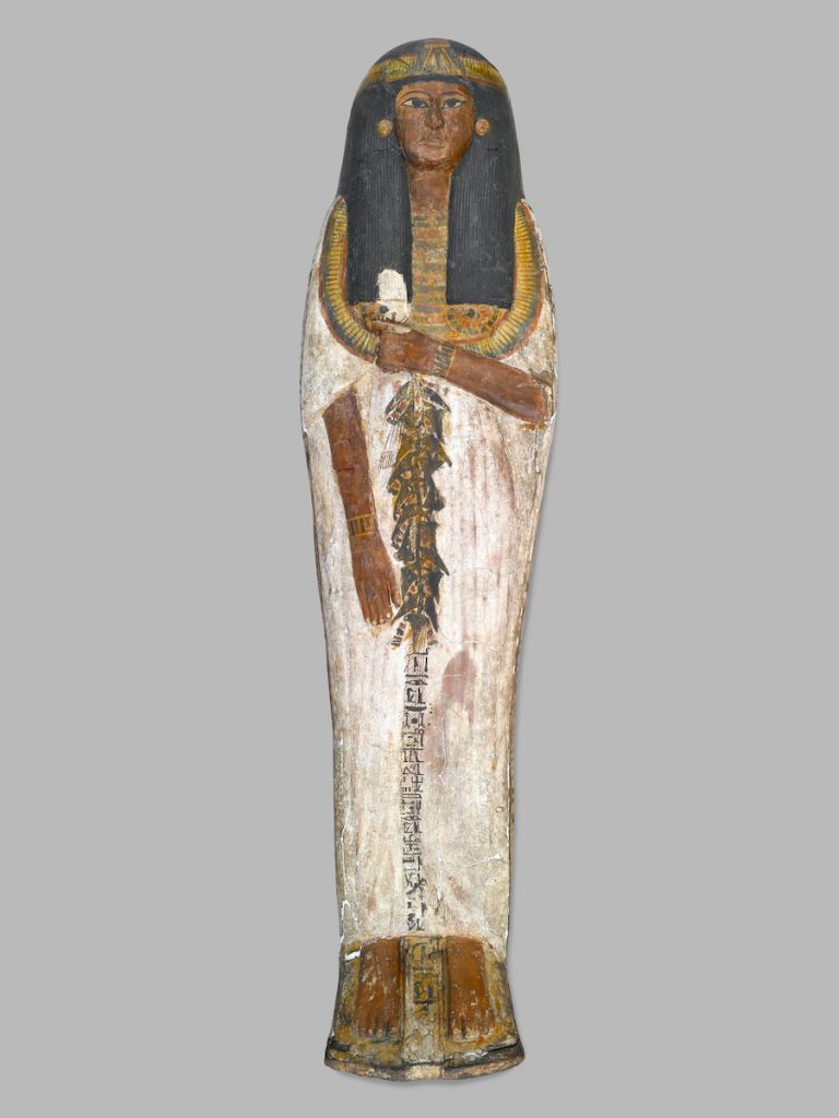 Coffin of the Lady of the House, Weretwahset, Reinscribed for Bensuipet Containing Face Mask and Openwork Body Covering, circa 1292-1190 B.C.E. Wood, painted (fragments a, b); Cartonnage, wood (fragment c; cartonnage (fragment d) , 37.47Ea-b Box with Lid in place: 25 ⅜ x 19 ¾ x 76 ⅛ in. (64.5 x 50 x 193.5 cm). Charles Edwin Wilbour Fund, 37.47Ea-d. (Photo: Sarah DeSantis, Brooklyn Museum)