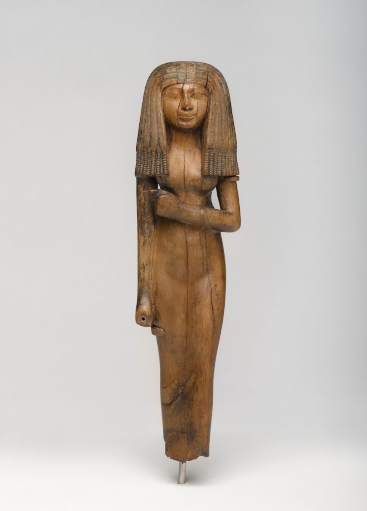 Statuette of a Woman, circa 1390-1353 B.C.E. Wood, 10 ⅛ x 2 ¾ x 1 ⅞ in. (25.6 x 7 x 4.8 cm). Charles Edwin Wilbour Fund, 54.29. (Photo: Jonathan Dorado, Brooklyn Museum)